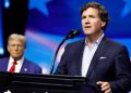 Tucker Carlson says father Trump will give ‘spanking’ at rowdy Georgia rally
